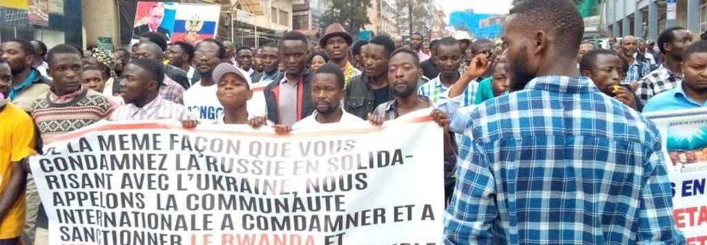Protests in DRC, credit to Bureau de Soutien. Banner: in the same way that you condemn Russia in solidarity with Ukraine, we call on the international community to condemn and sanction Rwanda and Uganda by supporting the Congolese people