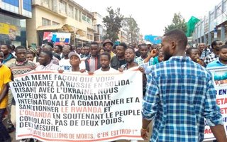 Protests in DRC, credit to Bureau de Soutien. Banner: in the same way that you condemn Russia in solidarity with Ukraine, we call on the international community to condemn and sanction Rwanda and Uganda by supporting the Congolese people